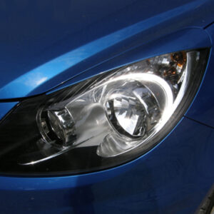 Cejas de faros Opel Corsa D (2006-2011)